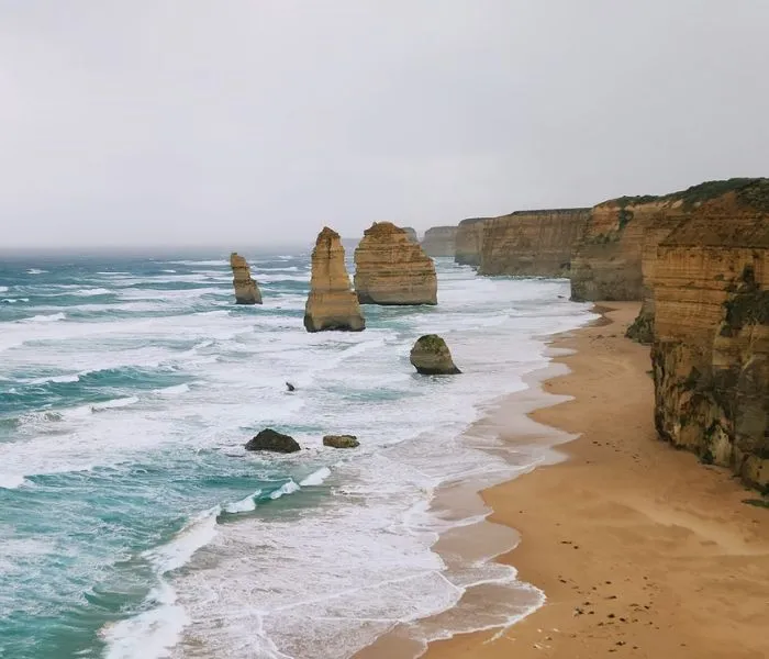 Scenic view of the 12 Apostles along Victoria’s Great Ocean Road, showcasing the dramatic limestone cliffs and ocean waves.