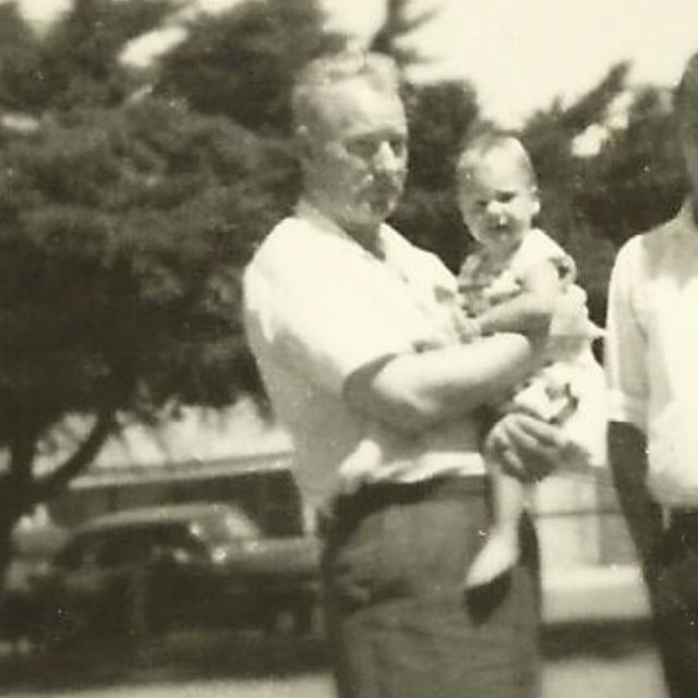 thomas-shield-bell-b1912 Thomas Shield Bell holding grandchild